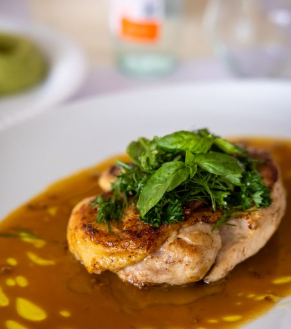Smothered Chicken Thighs Recipe (Tender & Creamy Gravy)